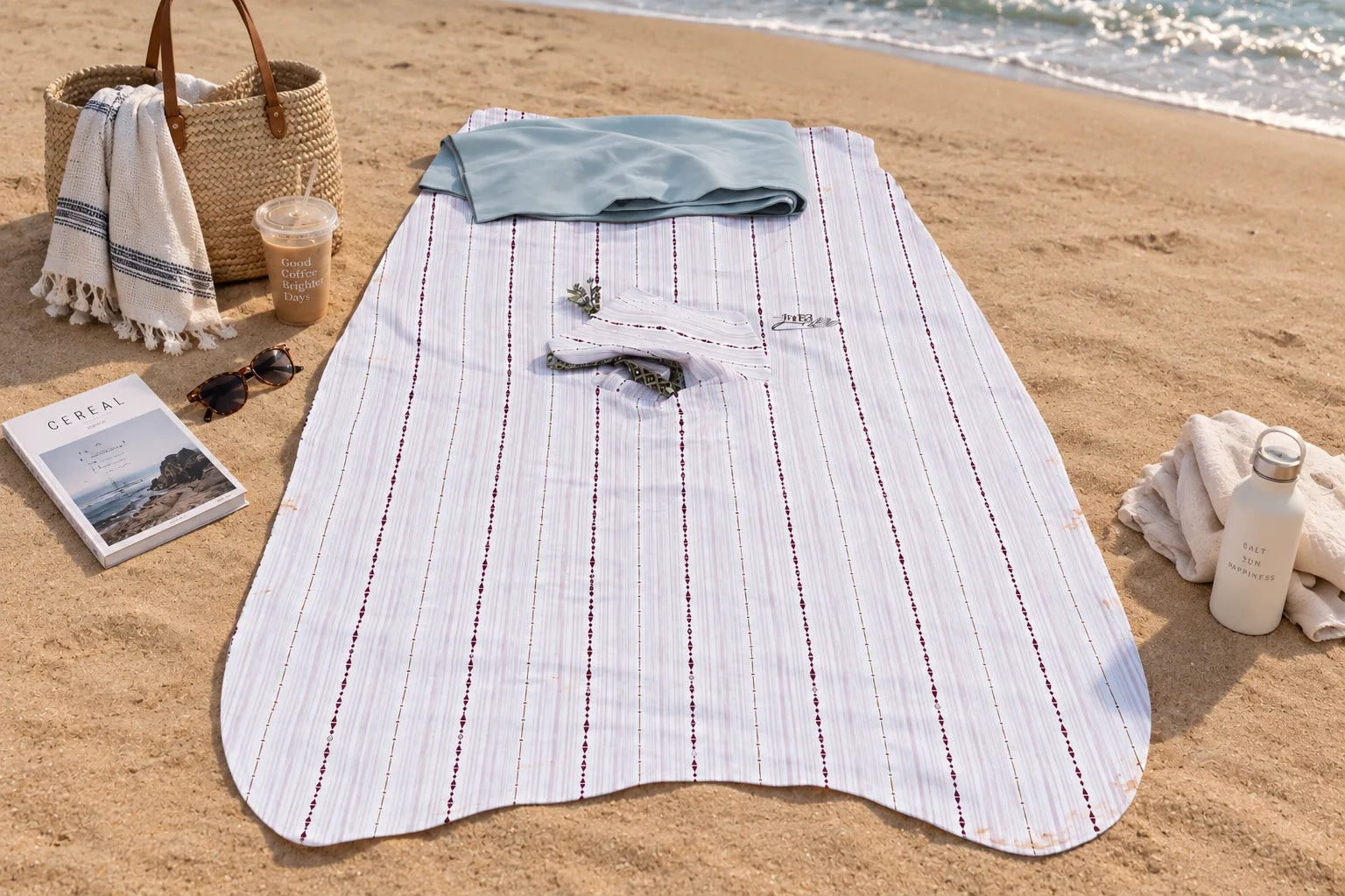 Cuttle Hood laid out on the sand